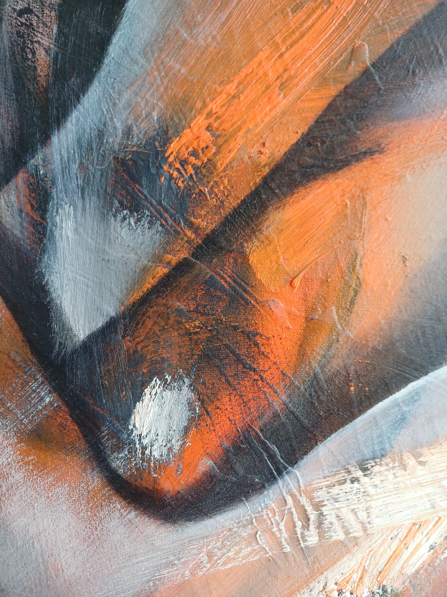 Detalle de la abstracción en tonalidades naranjas y grises