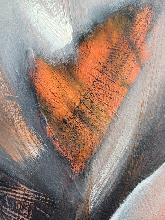 Detalle de la abstracción en tonalidades naranjas y grises