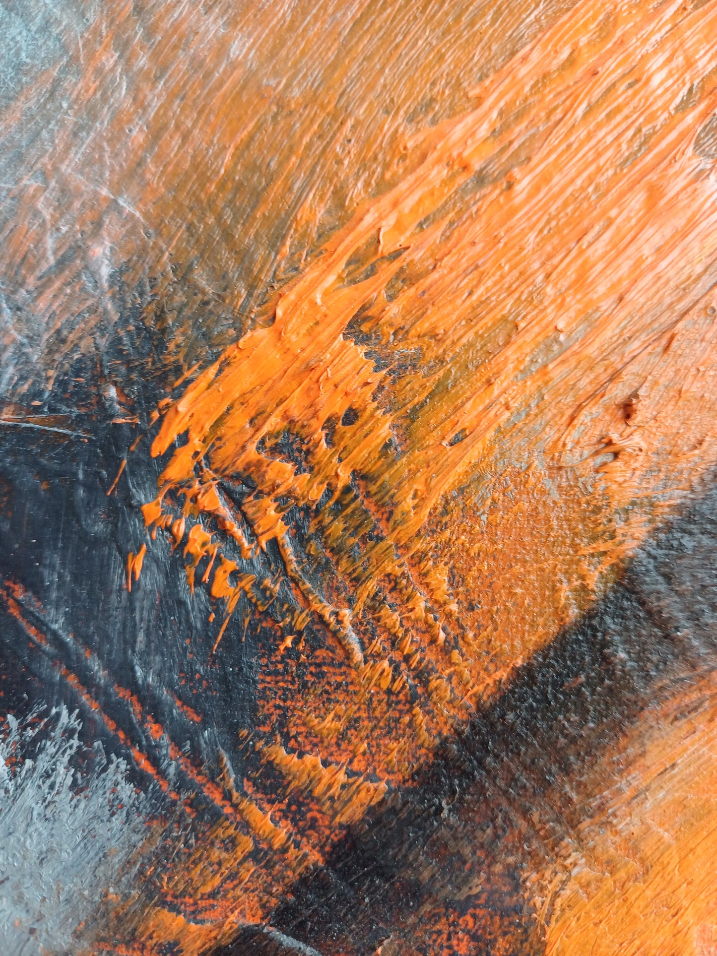 Detalle de la abstracción en tonalidades naranjas y grises