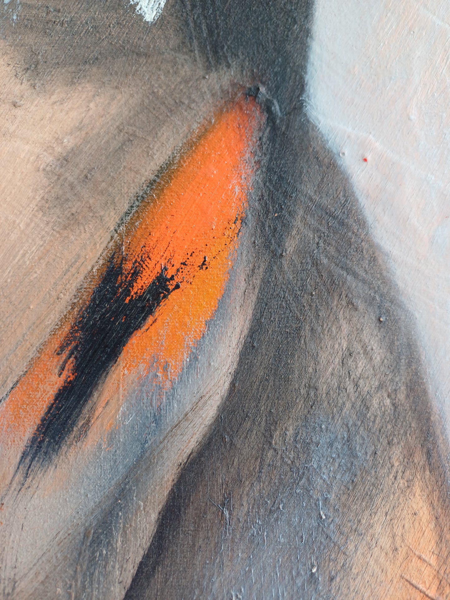 Detalle de la abstracción en tonalidades naranjas y grises