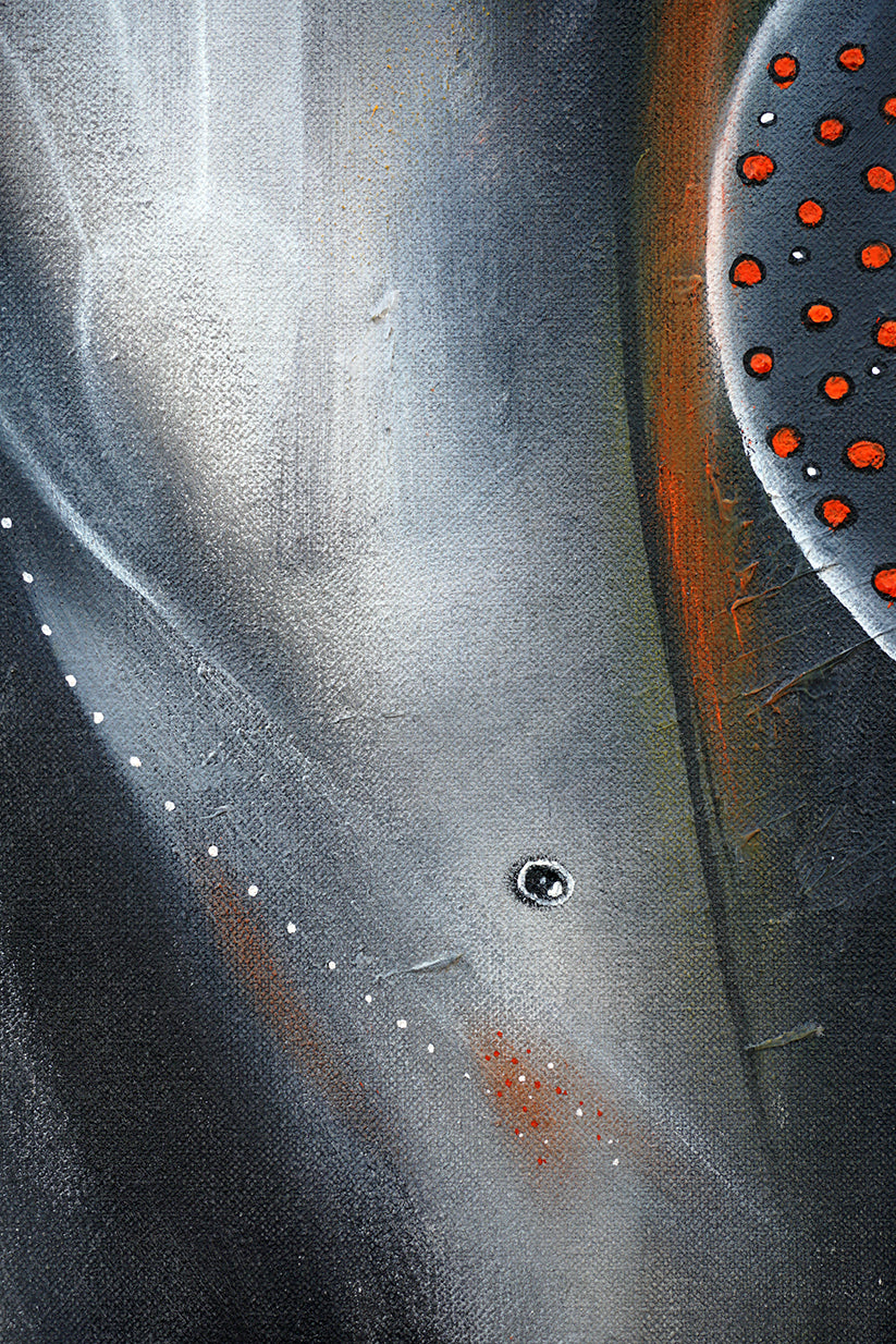 Detalle de abstracción con tonos anaranjados y grisáceos.
