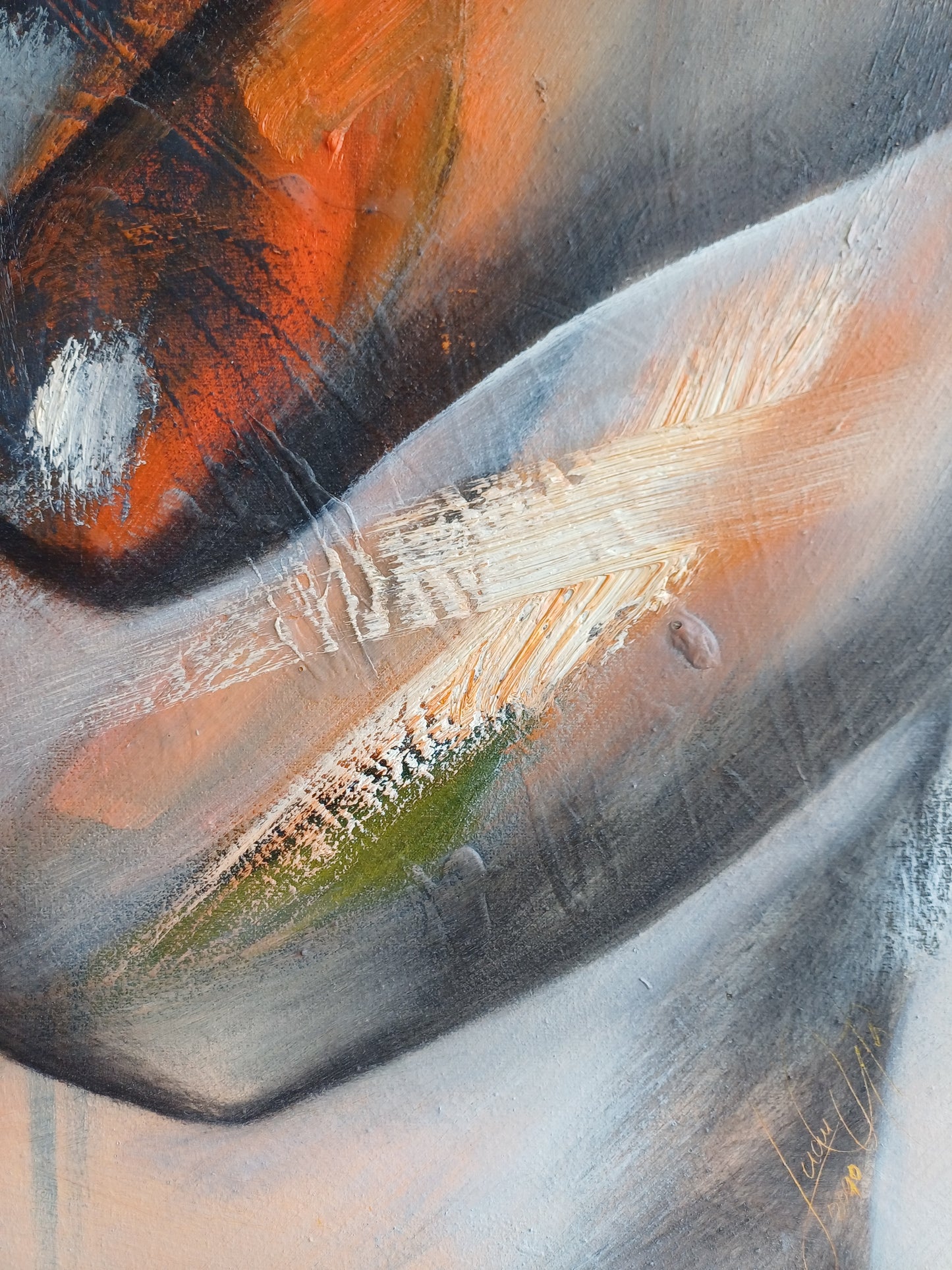 Detalle de la abstracción en tonalidades naranjas y grises