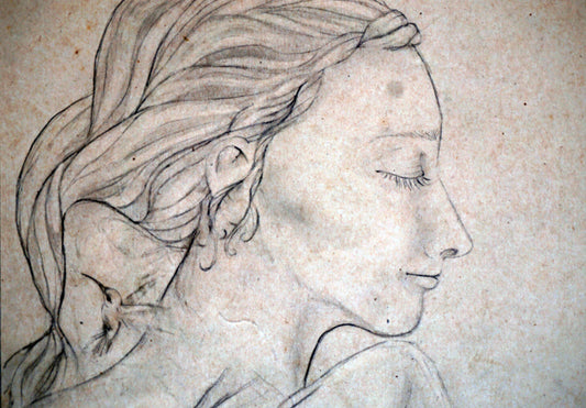 Detalle de rostro femenino con los cerrados.